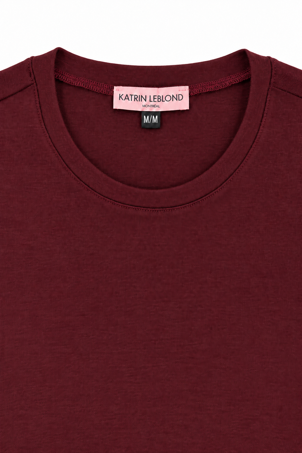 Burgundy merino crew neck collar detail, colour matched to sleeve
