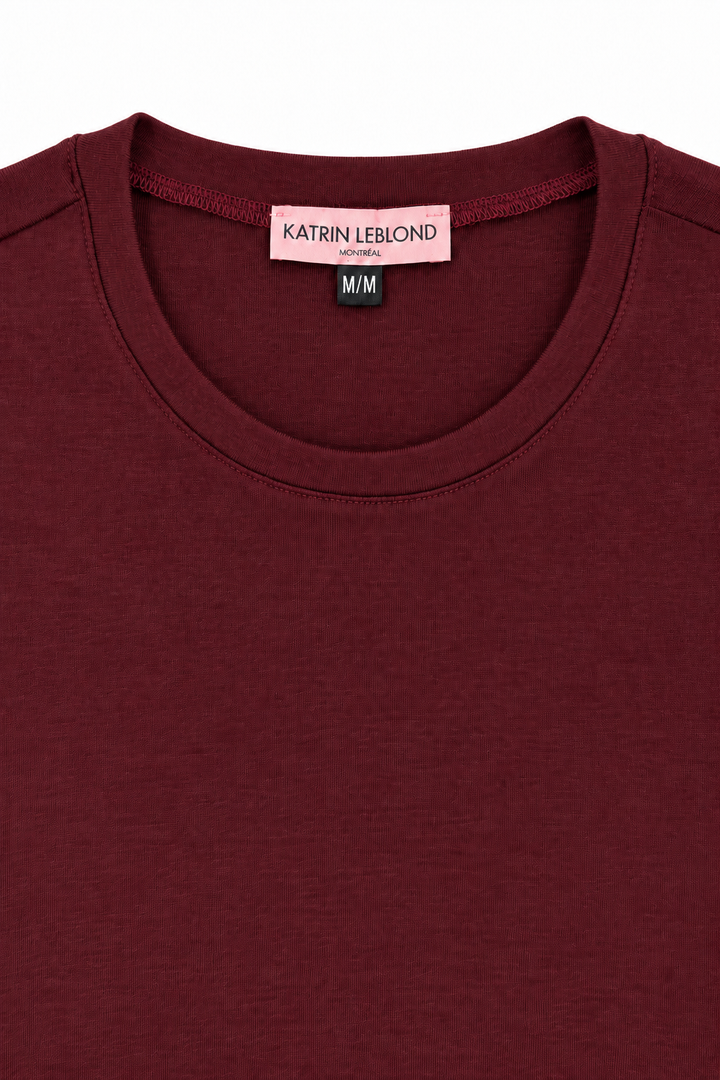 Burgundy merino crew neck collar detail, colour matched to sleeve