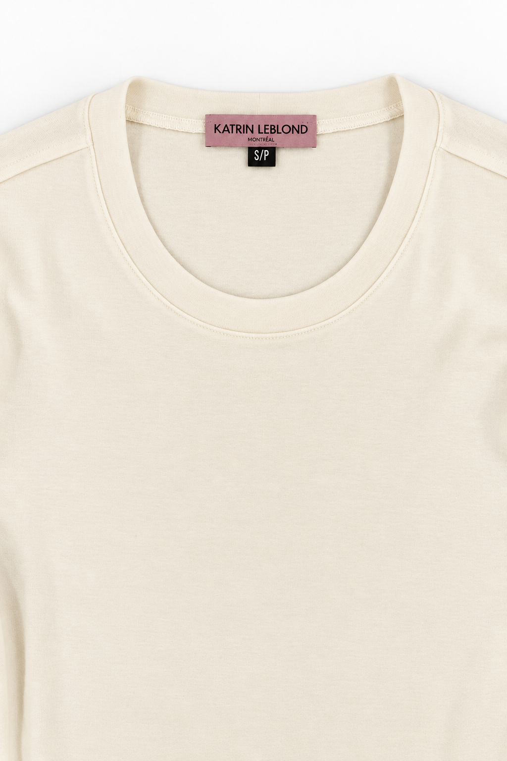 Ivory Tencel and merino wool top, neckline and Katrin Leblond label detail