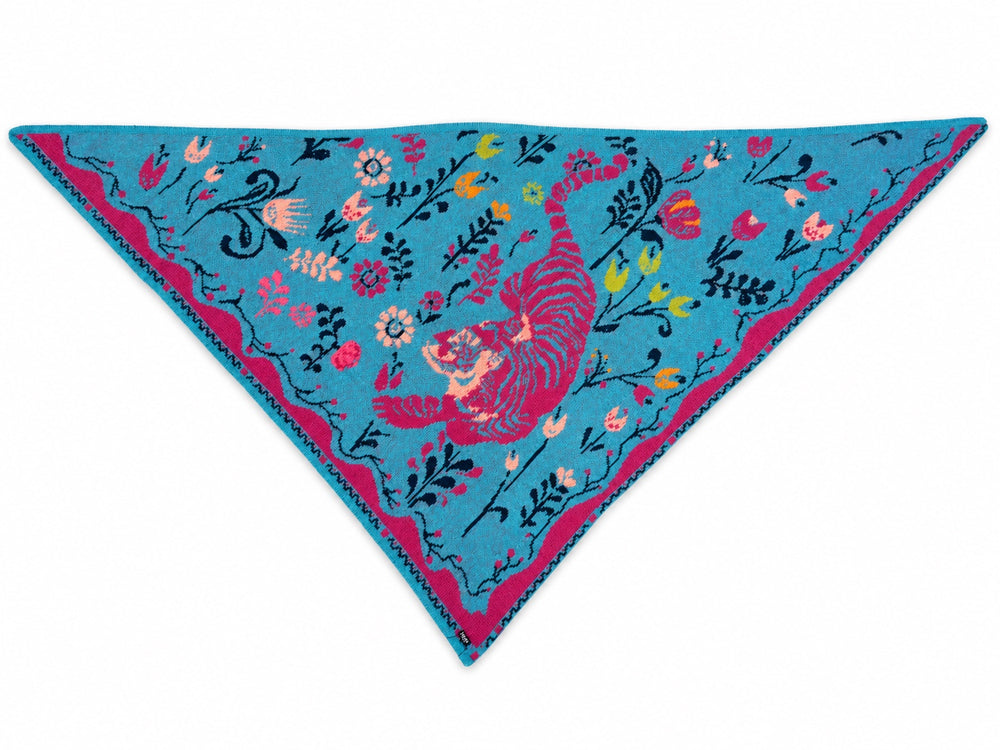 IVKO Wild Garden triangle scarf in Adria turquoise laid flat with its point down, showing the tiger, flowers and pink border.